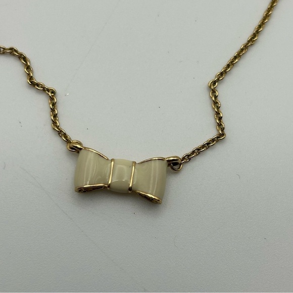 Kate Spade Gold Tone Chain with White Enamel Bow Ribbon Charm Short Necklace 19" - Picture 8 of 10